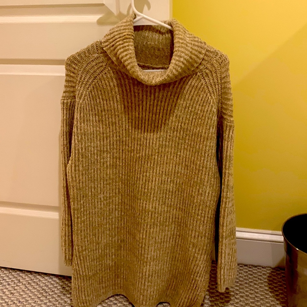 Oversized chunky turtle neck sweater. Beige in color. Very warm. Never worn